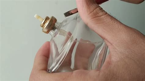 how to remove chanel perfume to atomizer